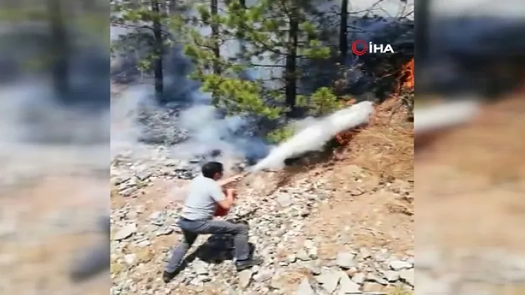 Yolcu treni yangına denk geldi! makinistler büyümeden söndürdü...