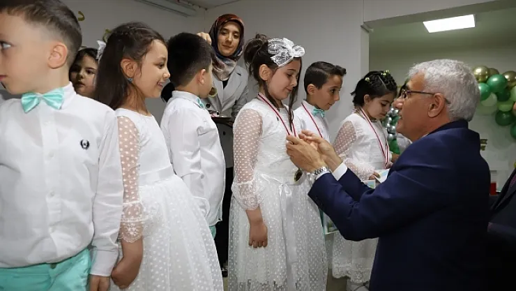 Başkan Güder, minik öğrencilerin Kur'an-ı Kerim'e geçiş törenine katıldı